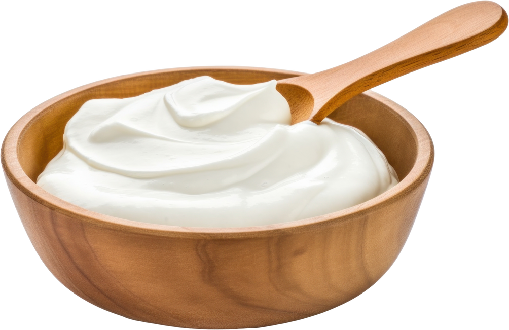 Sour cream in wooden bowl with spoon, mayonnaise, yogurt, isolated.